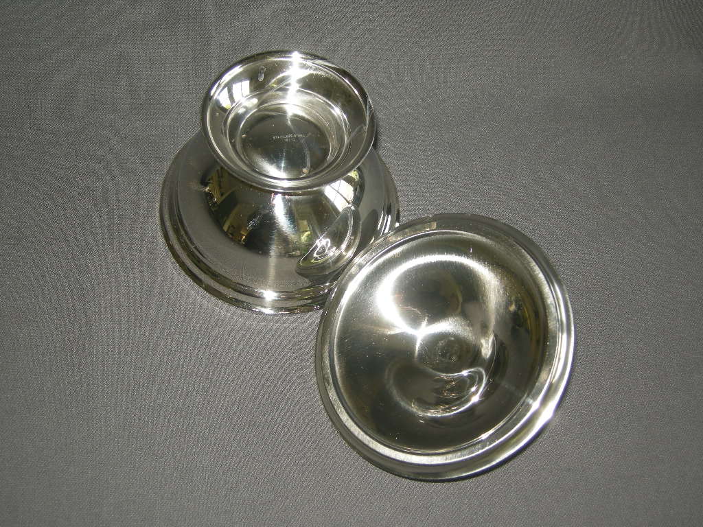 roestvrijstaal 014. Set van 4 dekschaaltjes O12 cm.
