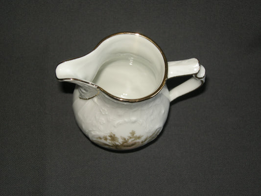 Rosenthal Sanssouci spierwit met bruin/rose roos + goudkleurig randje melkkannetje