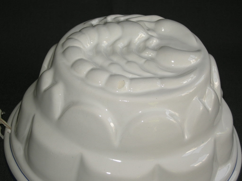 diverse puddingvormen 002. wit met blauwe rand