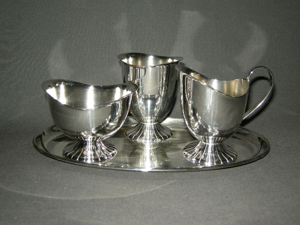 Verzilverde accessoires 004. 4-delig roomstel van D.E.