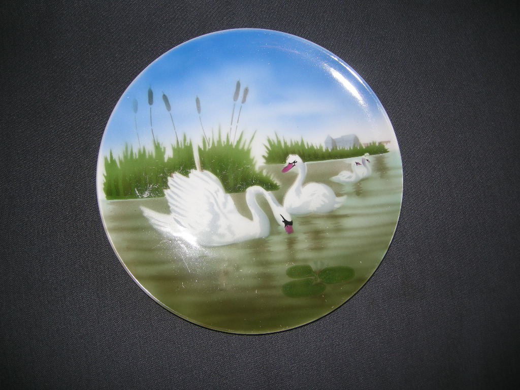 Societe Ceramique S50 wandbord 005. 4 zwanen in het riet