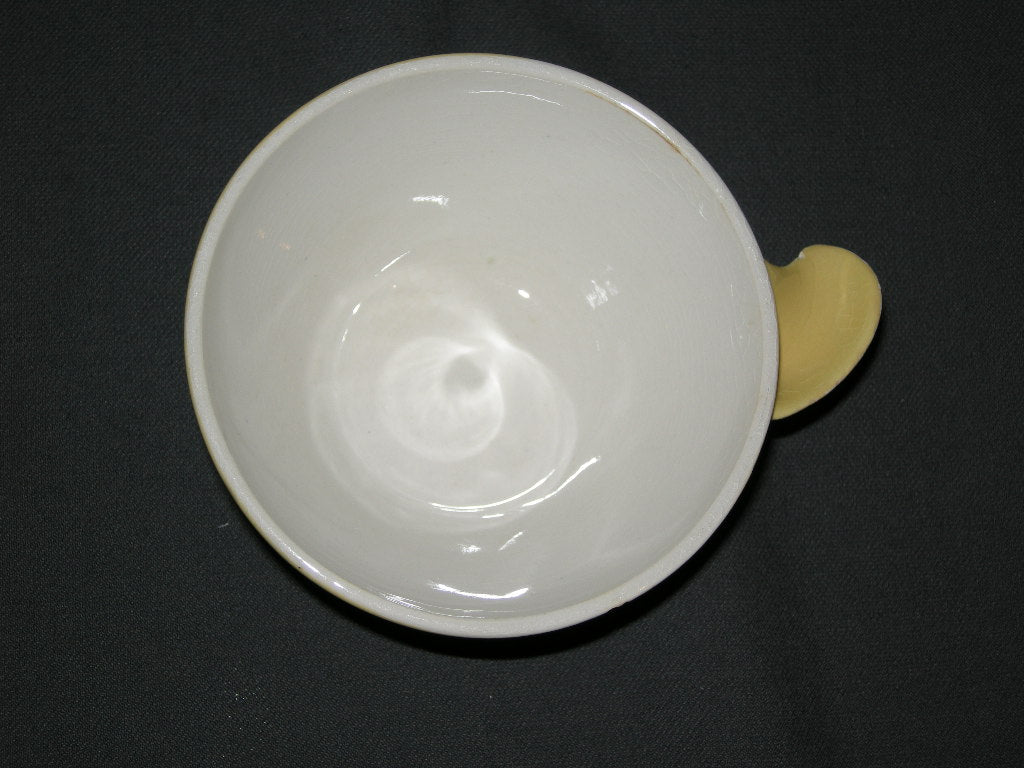 Petrus Regout / Royal Sphinx pastel okergeel 006. soepschaaltje