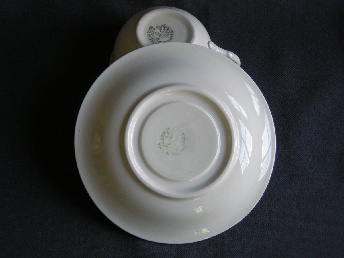 Societe Ceramique roomwit 009. kop & schotel met dubbel oor