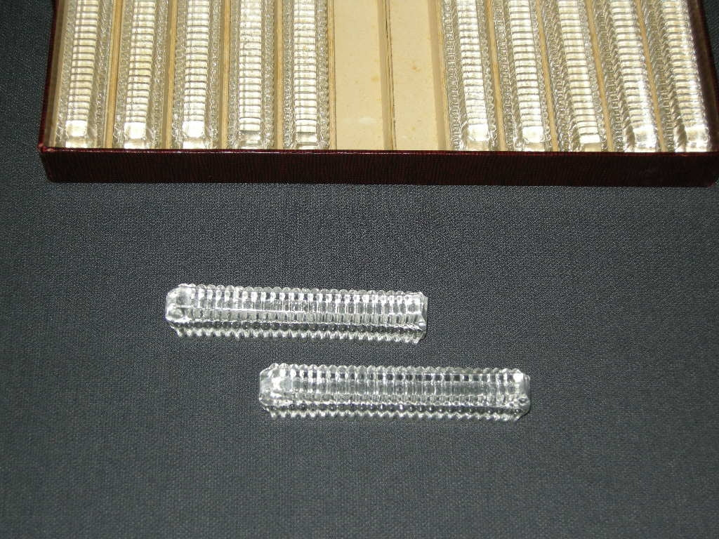 Gebruikt glas / kristal messenleggers 006. 12 stuks in origineel doosje