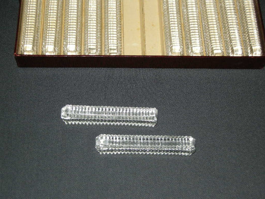Gebruikt glas / kristal messenleggers 006. 12 stuks in origineel doosje