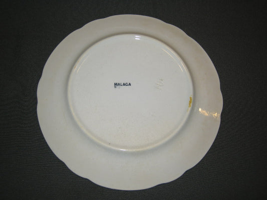 Petrus Regout Malaga blauw met geschulpte rand bord c O23,5 cm. met lichte verkleurde plekjes