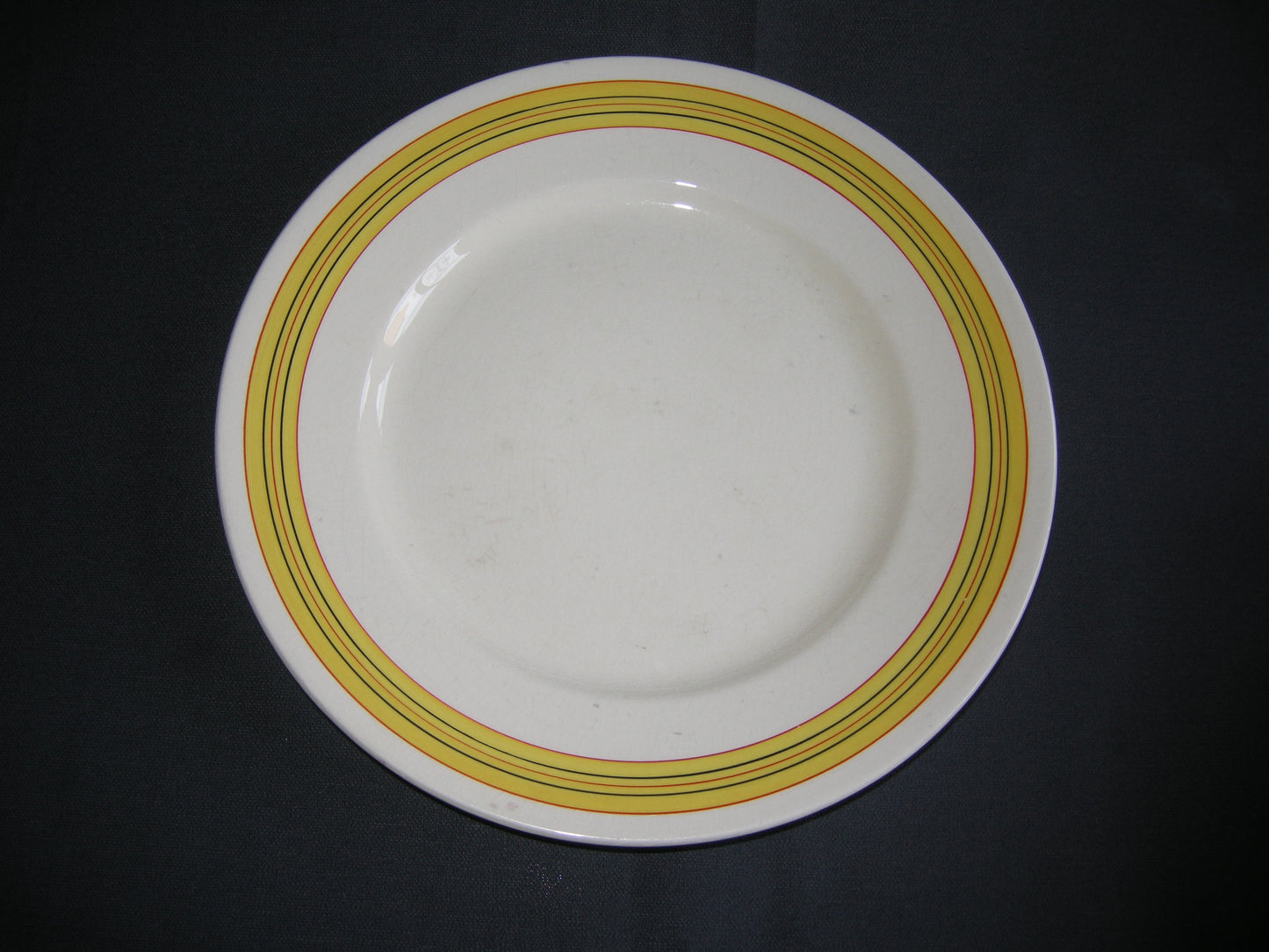 MOSA plateel roomwit met geel / zwart / oranje dinerborden