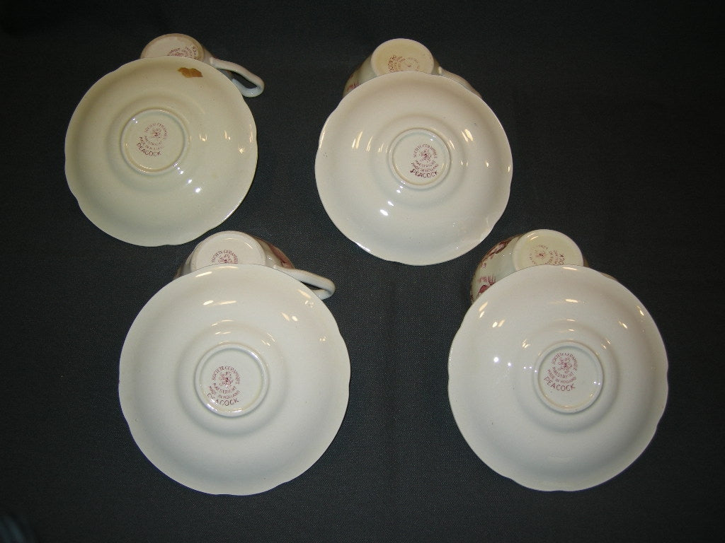 Societe Ceramique Peacock rood kop & schotels met mankementjes