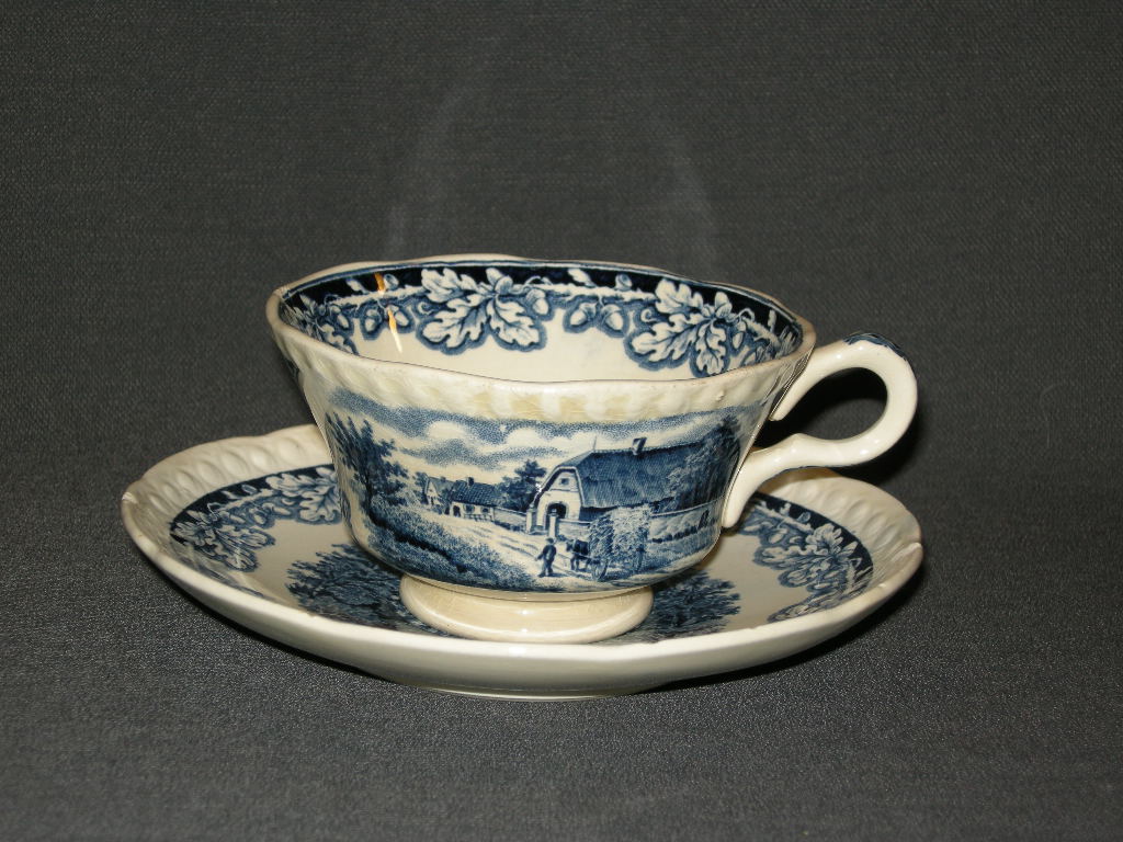 Societé Ceramique Boerenhoeve blauw kop & schotel met verkleuring + lichte beschadiging