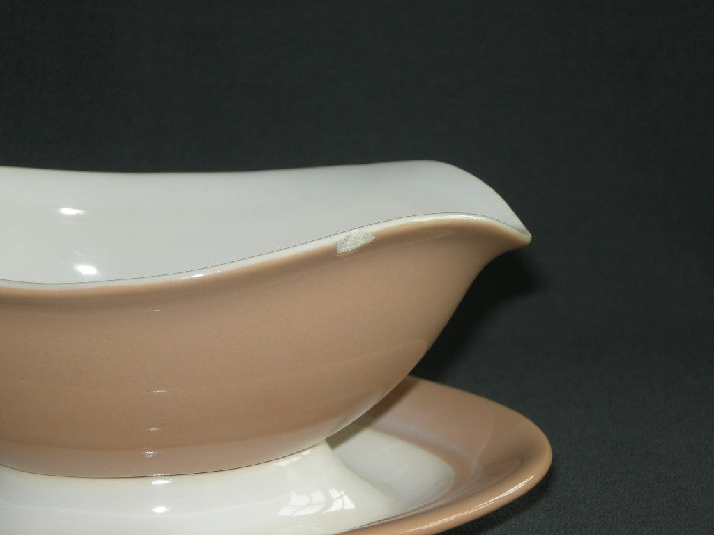 Huizen pastel zalmrose sauskom