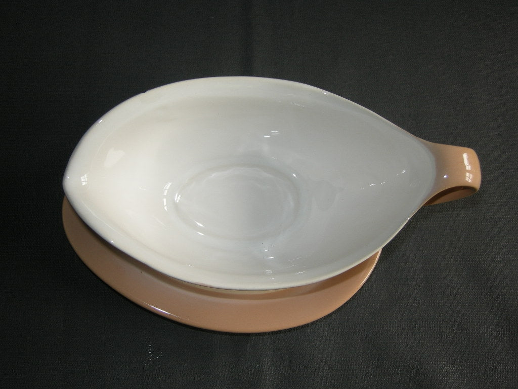 Huizen pastel zalmrose sauskom