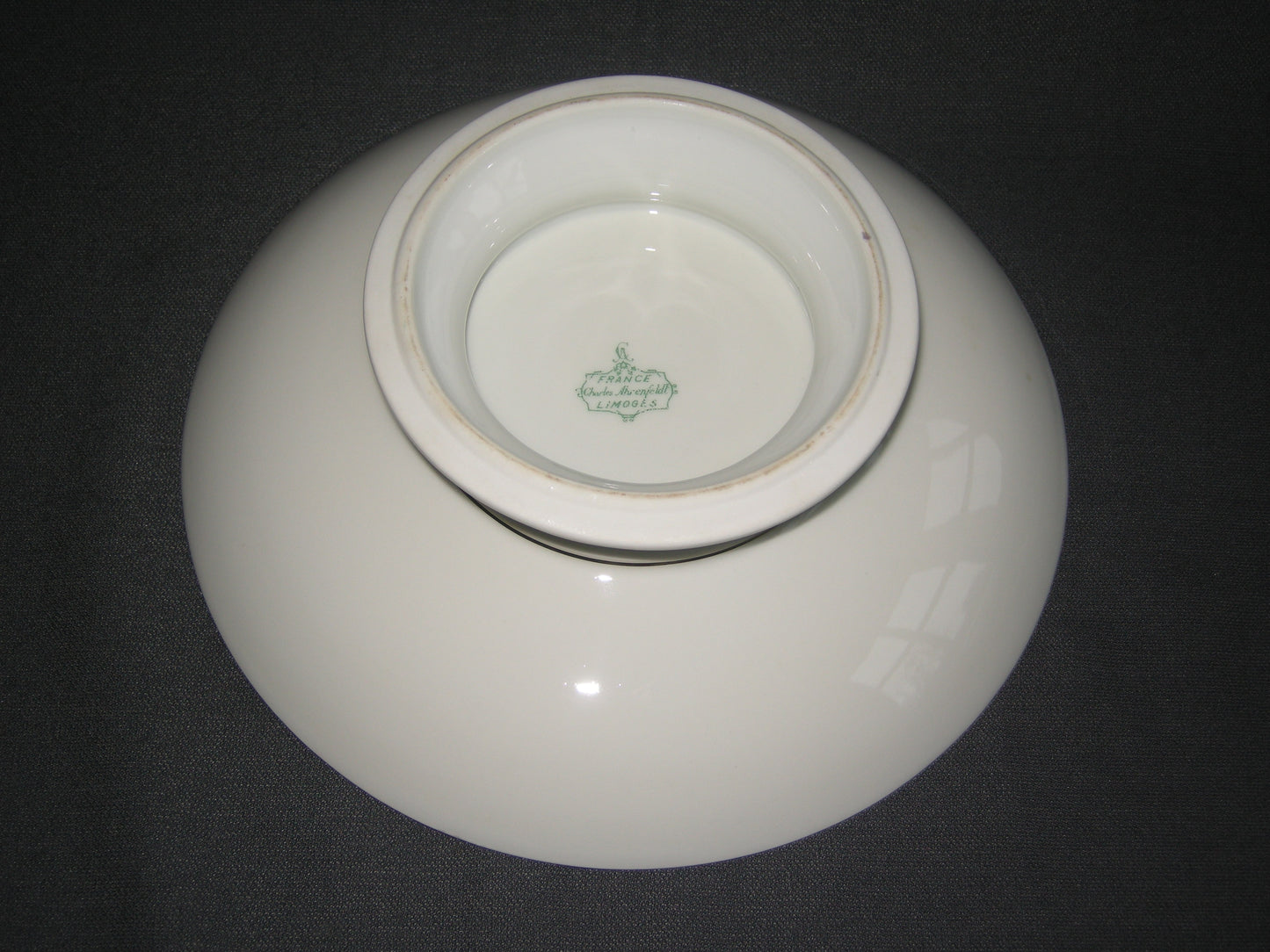 Limoges Charles Ahrenfeldt presenteerschaal op voet O23 cm.