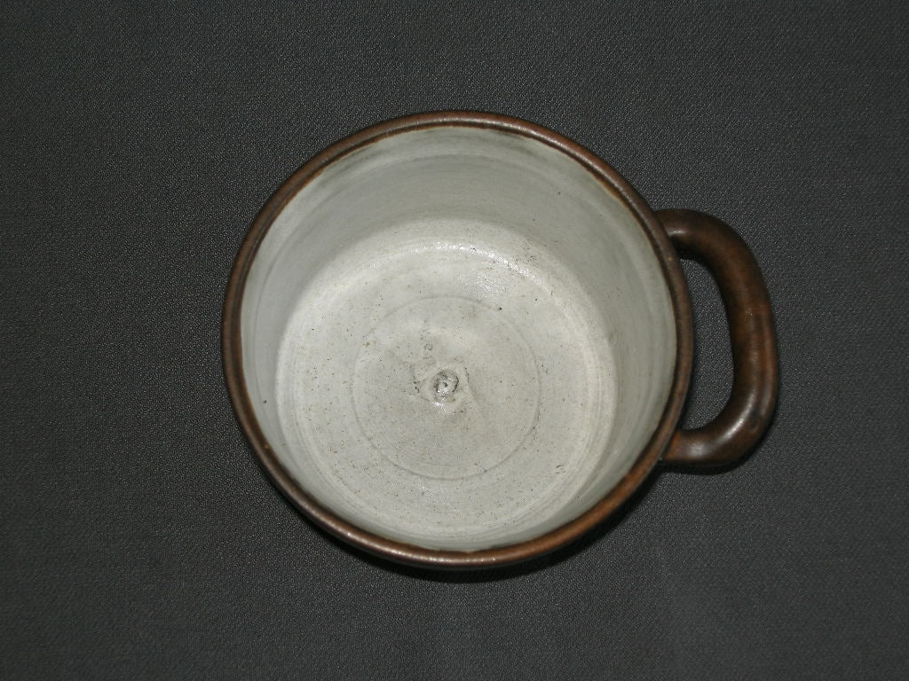 Lucie Q. Bakker Quirina bruin schaaltje 1 oor O9,5 cm.