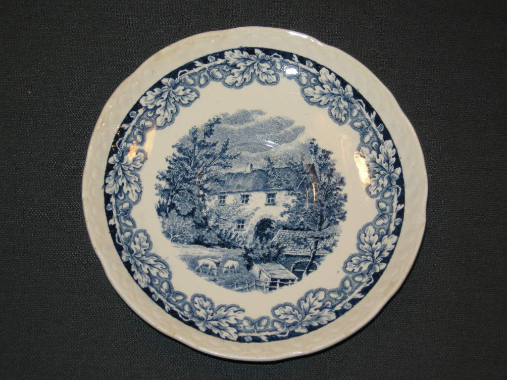 Societé Ceramique Boerenhoeve blauw kop & schotel met verkleuring + lichte beschadiging