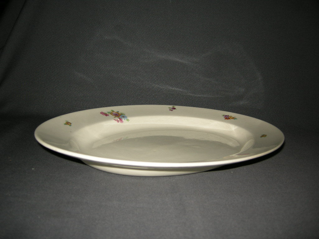 Petrus Regout Boudewijn 3262 donker vleesschaal 39,5 x 30,5 cm. gele bloem