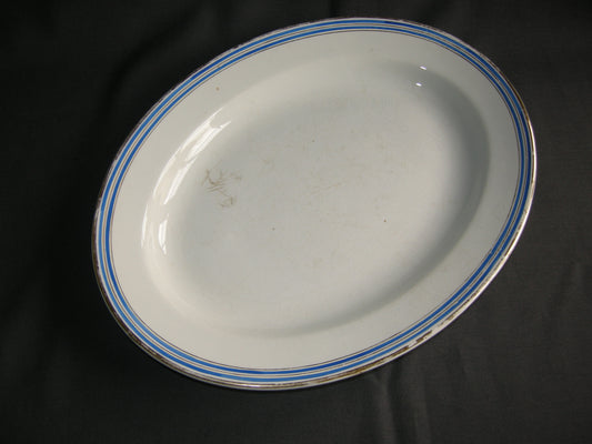 Faiencerie D'onnaing (Nord) roomwit - kobaltblauw vleesschaal 33,5 cm.