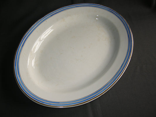 Faiencerie D'onnaing (Nord) roomwit - kobaltblauw vleesschaal 35,5 cm.
