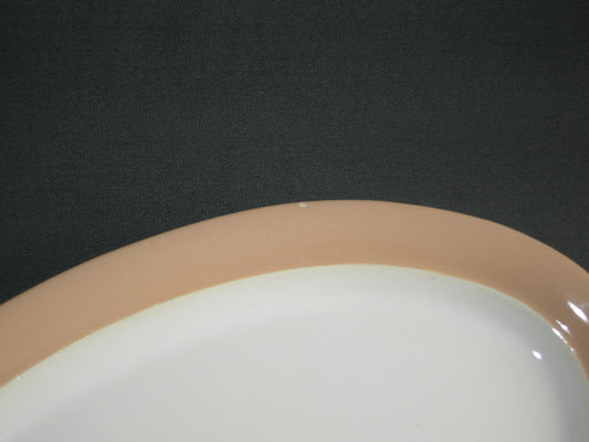 Huizen pastel zalmrose vleesschaal