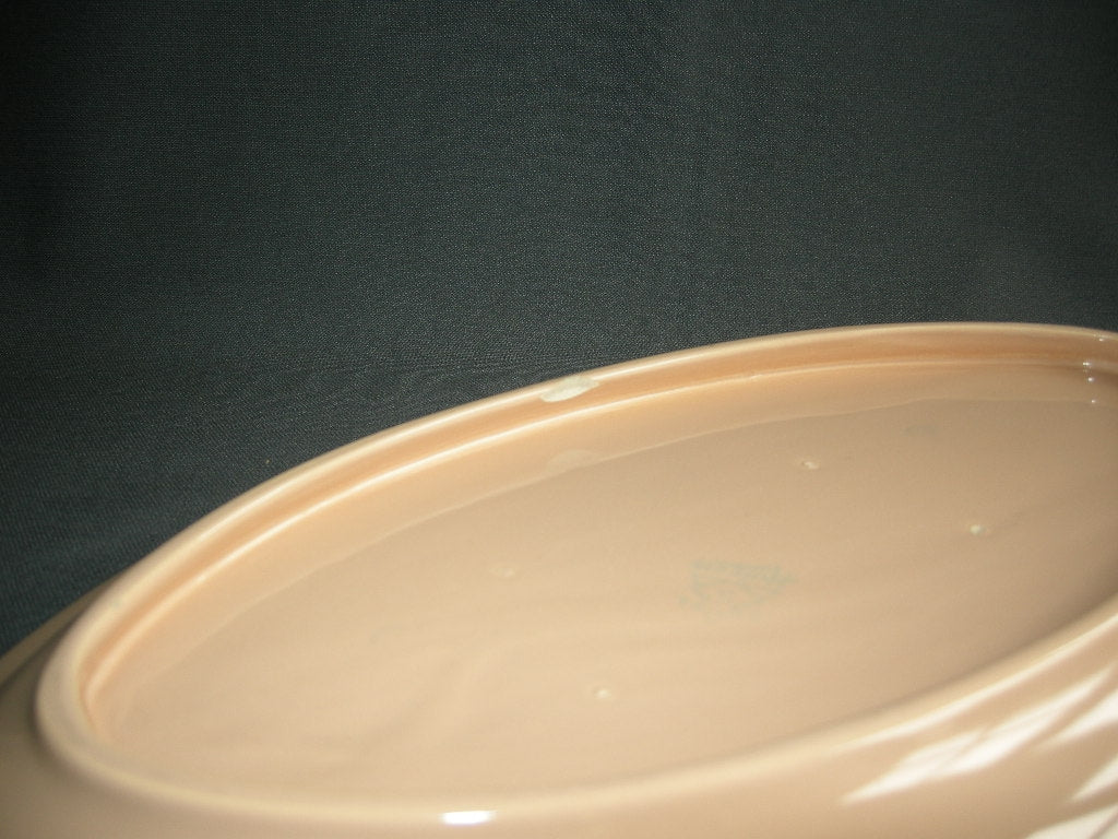 Huizen pastel zalmrose vleesschaal