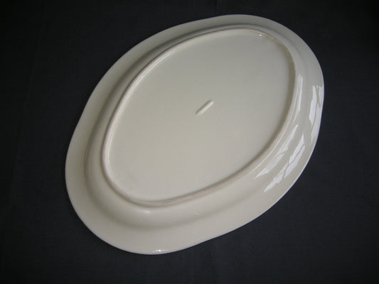 MOSA plateel roomwit met geel / zwart / oranje vleesschaal