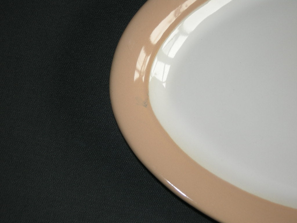 Huizen pastel zalmrose vleesschaal