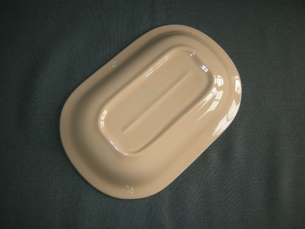Huizen pastel zalmrose vleesschaaltje