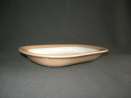 Huizen pastel zalmrose vleesschaaltje
