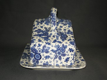 Societe Ceramique Beatrix kaasstolp met gebloemd onderbord