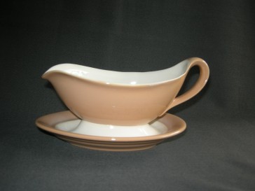 Huizen pastel zalmrose sauskom
