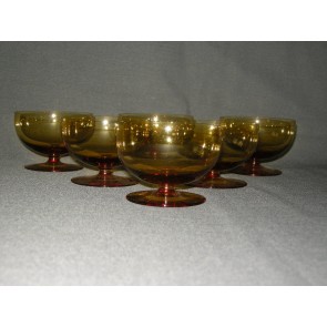 gekleurd glas 11.a coupes, doorsnee 8 cm., okergeel